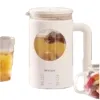 ويقوم غلاية التدفئة الكهربائية البيضاء بغلي الماء بسرعة للحفاظ على درجة الحرارة Item Picture